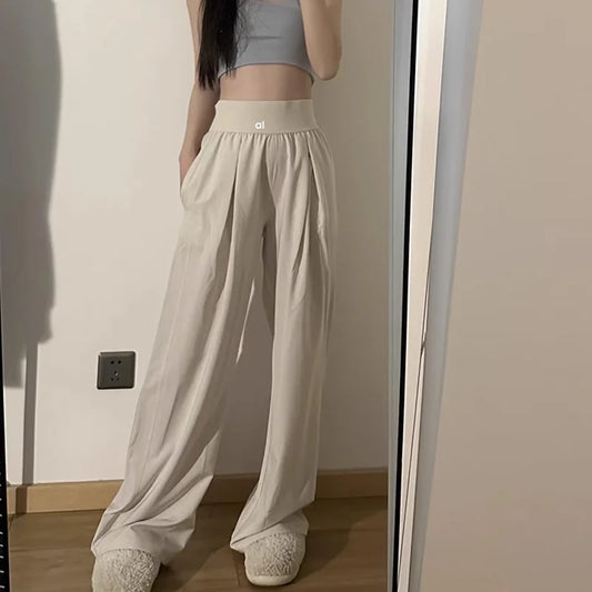 Model running in straight-leg yoga pants
